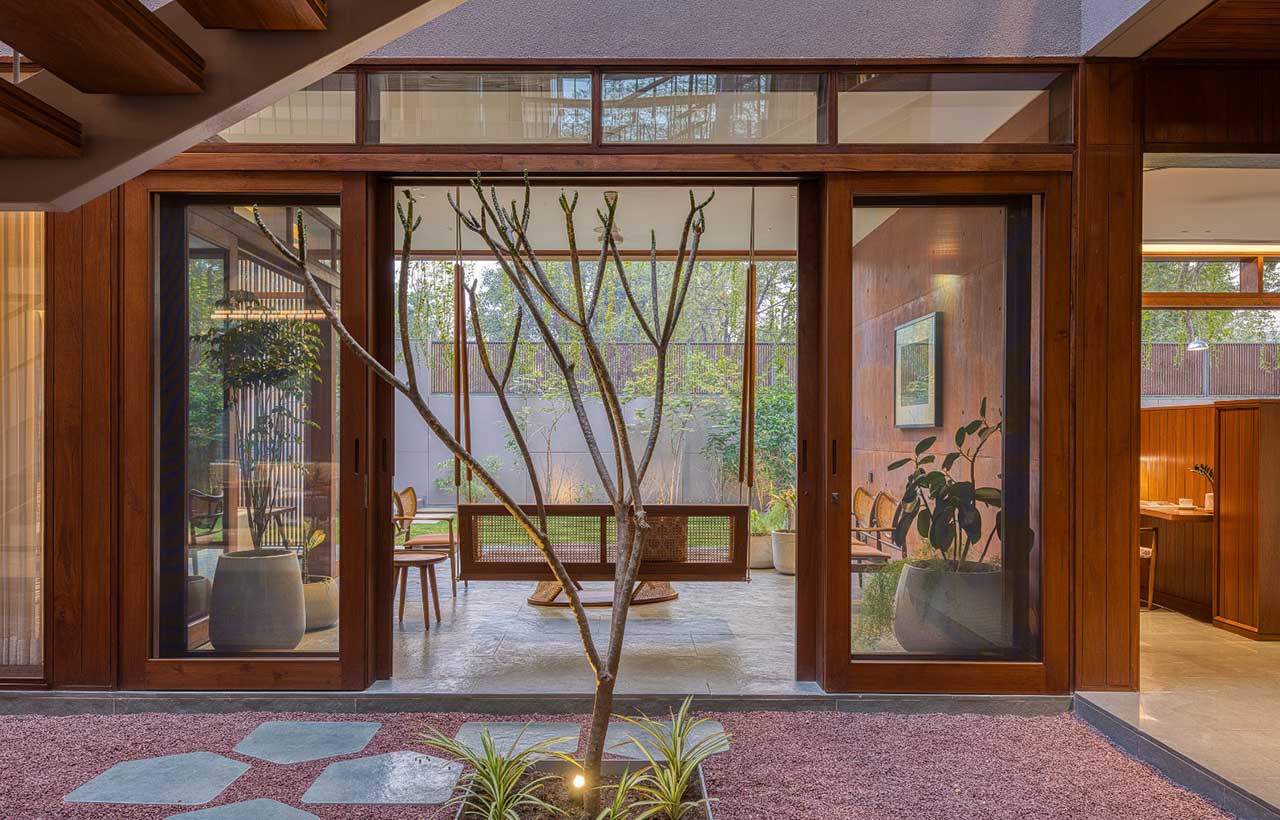 Courtyard and garden inside The Open House Ahmedabad