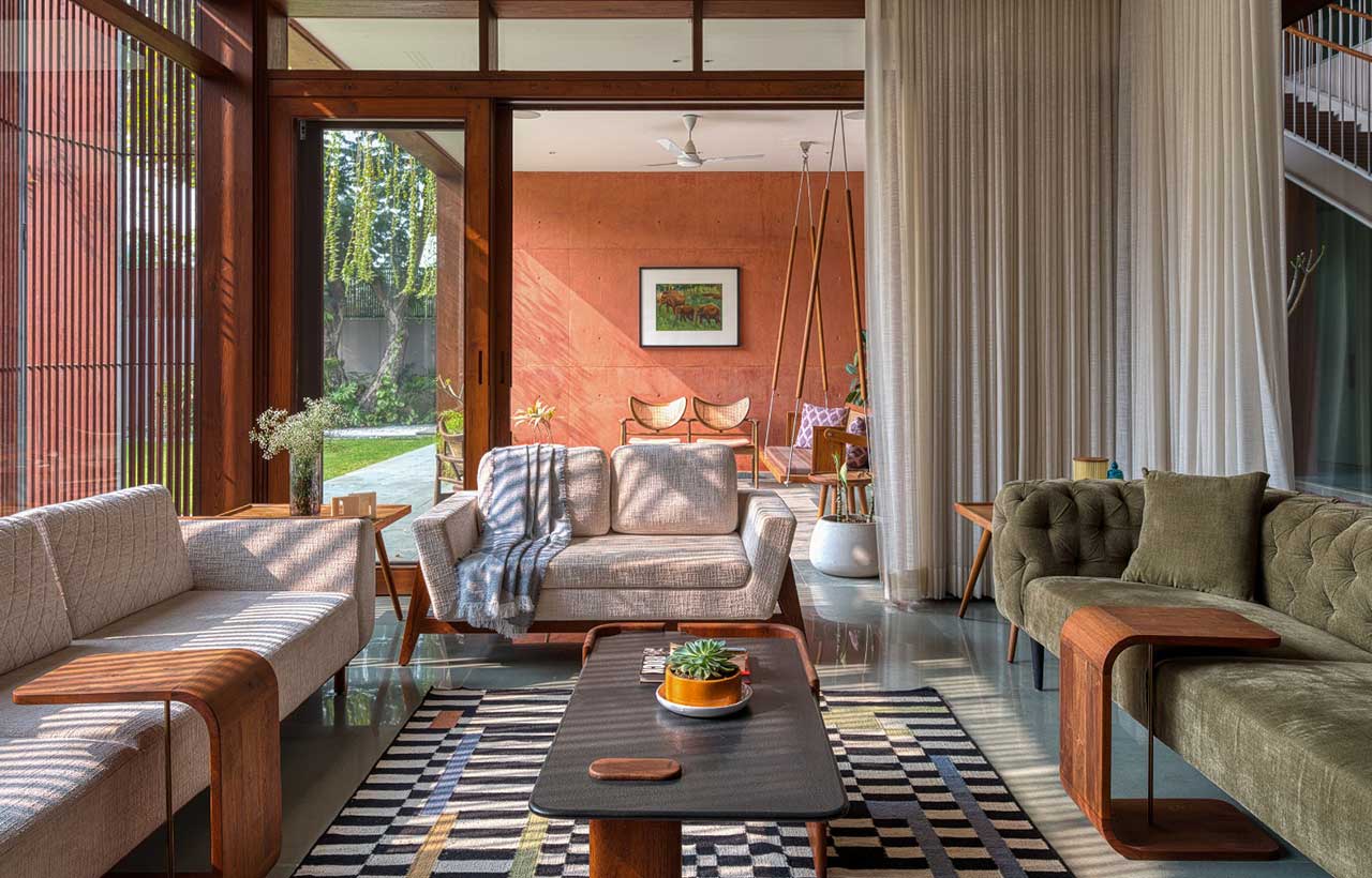 Contemporary living room opening towards landscaped garden