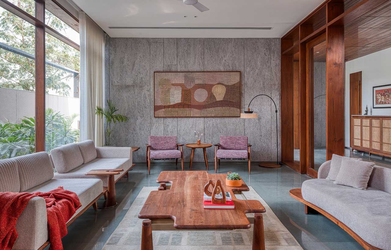 Contemporary Indian interior with red pigmented wall and artwork